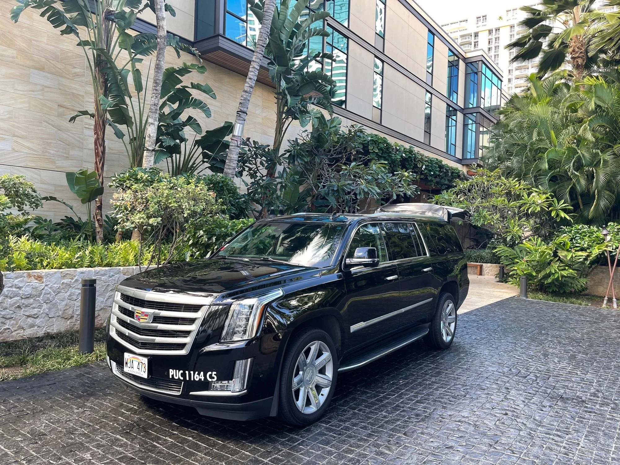 Private Escalade airport transfer at a Waikiki hotel