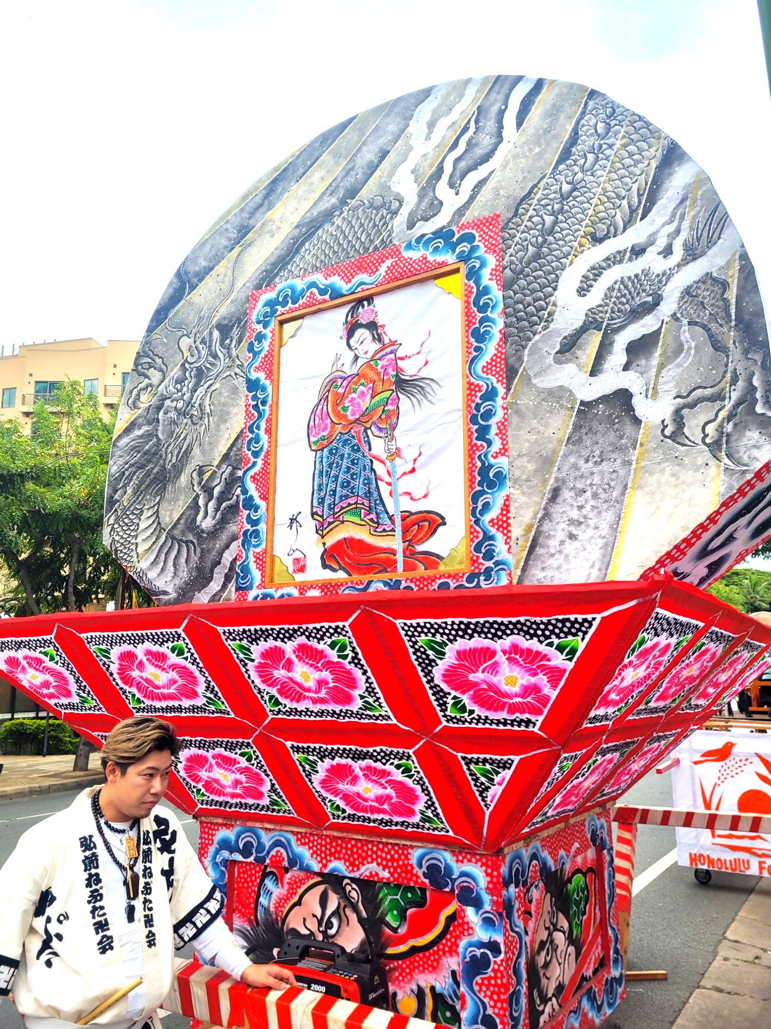 Nebuta float with dragon and geisha artwork at Honolulu Festival 2026 Grand Parade Waikiki