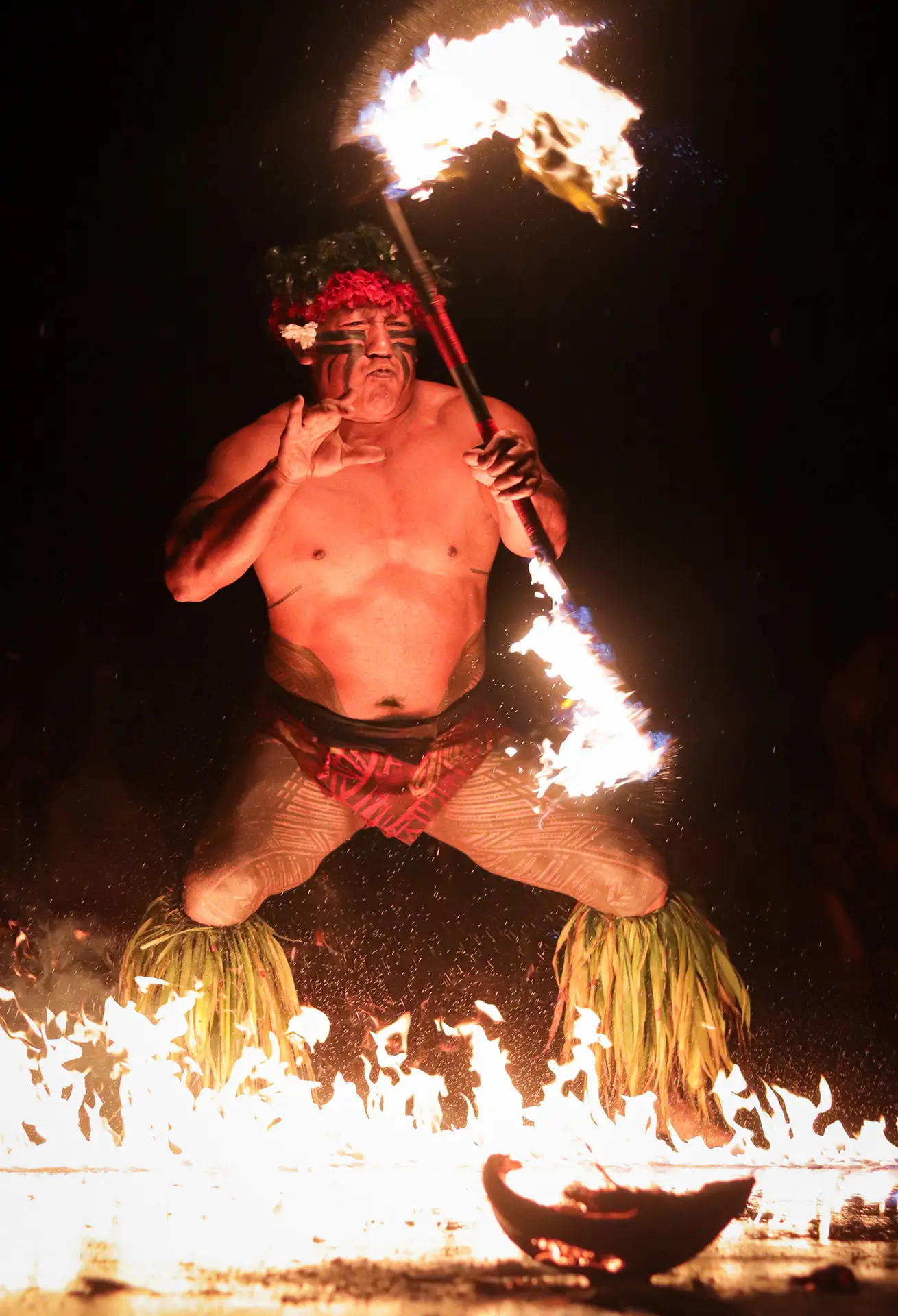 The Chief performing the fire knife dance